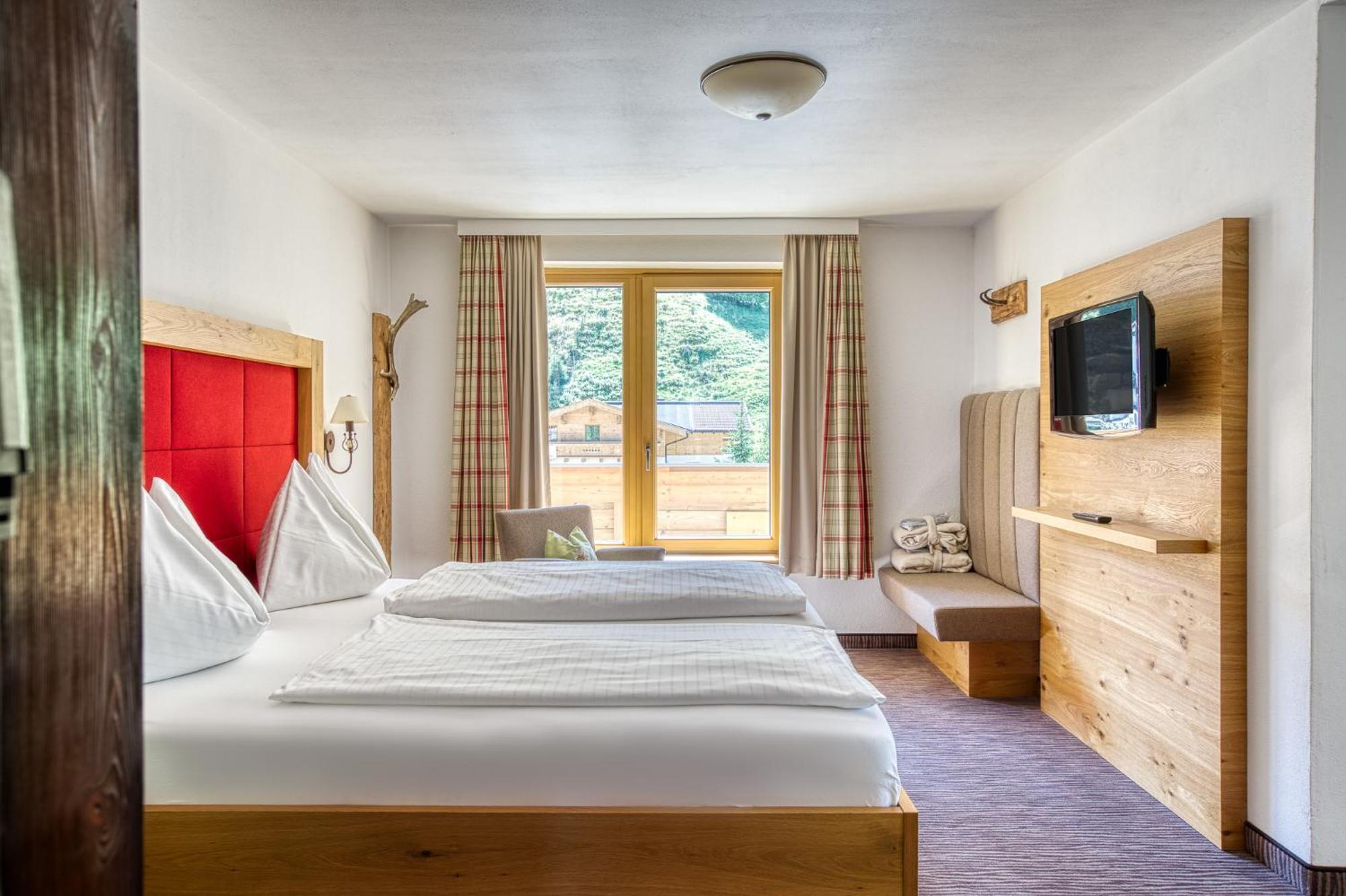 Edelweiss Suite met Balkon en Uitzicht op de Bergen