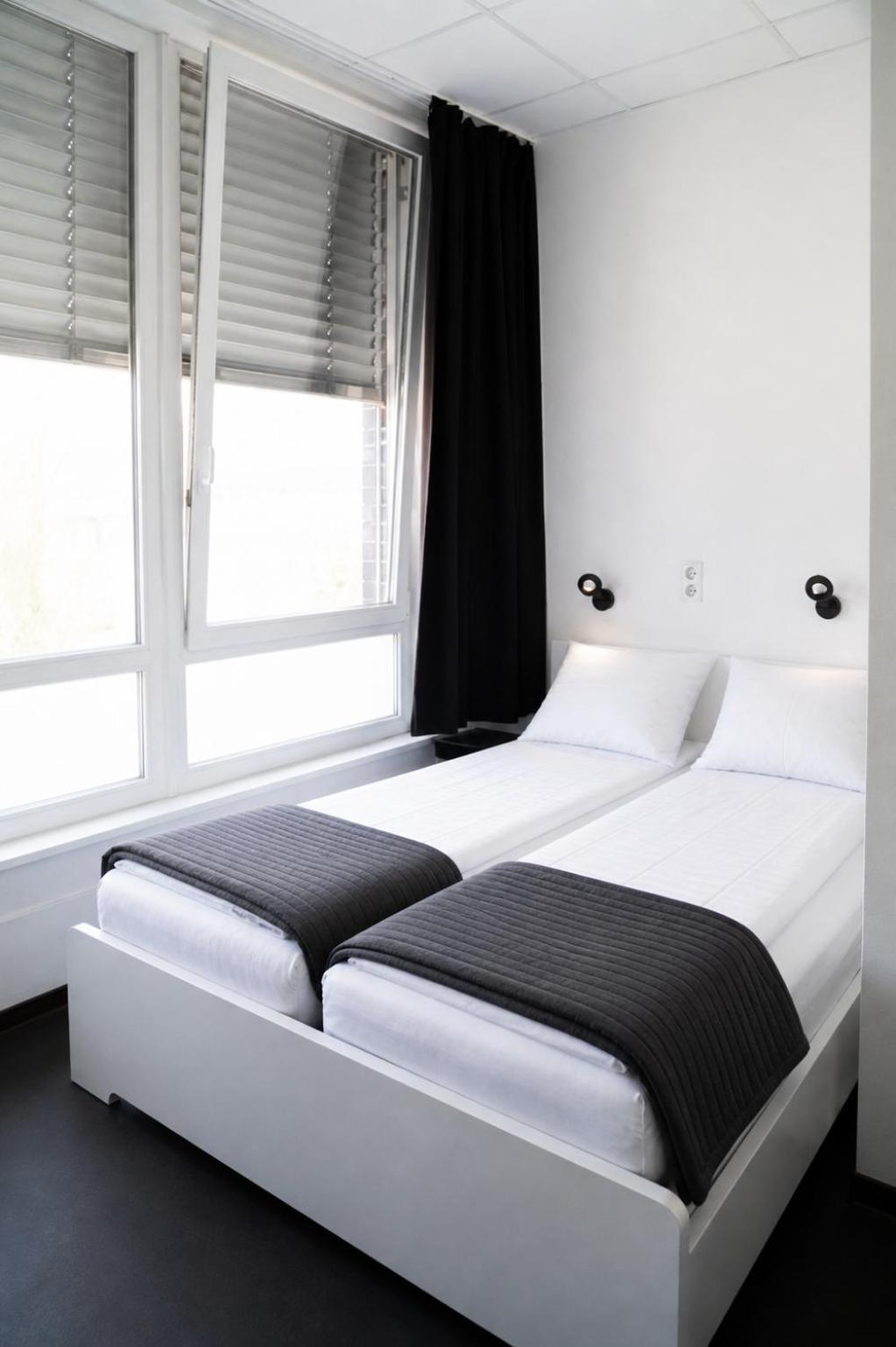Tweepersoonskamer met een Balkon en een Eigen 
Badkamer