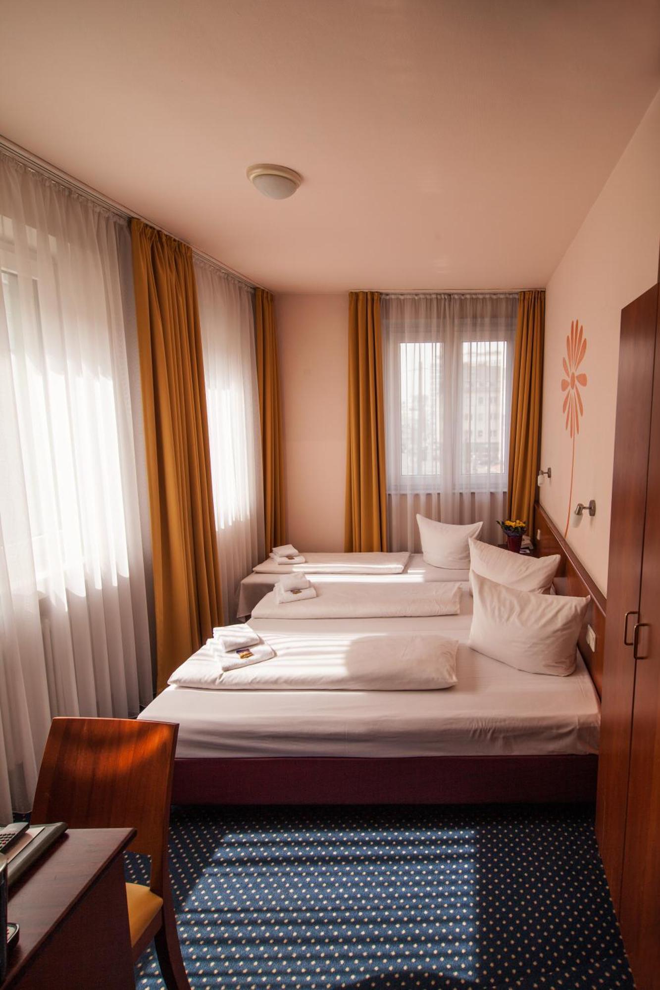 Dreibettzimmer